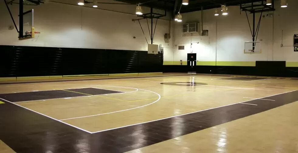 Indoor gym with sport court flooring