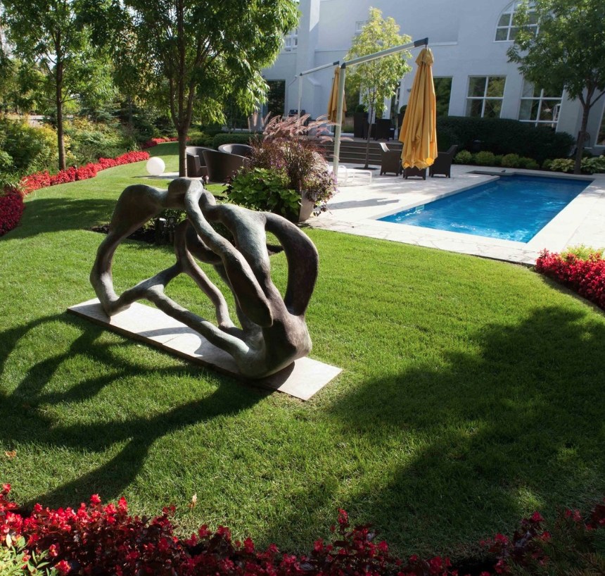 Sculpture garden with pool and water feature