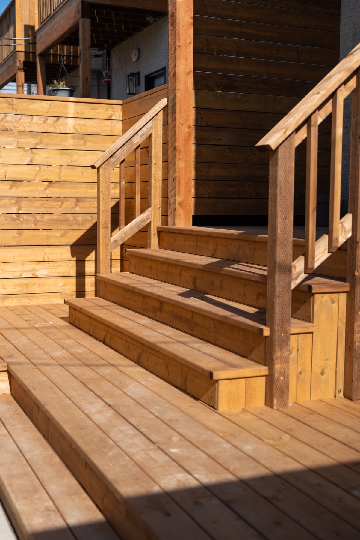 Custom cedar deck and steps built at the Centennial project